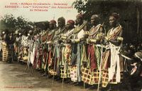 Left: Dance of the Fon chiefs during celebrations. Right: The celebration at Abomey(1908). The veteran warriors of the Fon king Béhanzin, Son of Roi Gélé