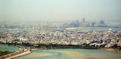 View of Muharraq with the skyline of Manama in the background