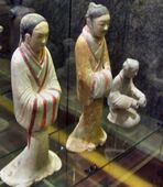 A female servant and a male advisor in Han shenyi, terracotta figurines from Western Han.