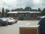 A refurbished stand-alone McDonald's in Portsmouth, إنگلترة. Unlike international McDonald's, British McDonald's are simply being refurbished rather than rebuilt.