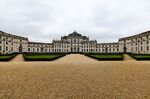 Large symmetrical palace complex with white walls