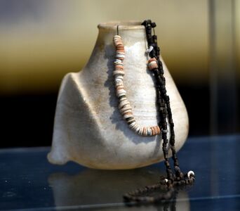 Alabaster vase and necklaces from Tell es-Sawwan, c. -6000 - -5800 National Museum of Iraq, Baghdad.