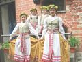 Girls wearing regional Aukštaičių-style folk dresses in Kaunas