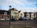 A row of small homes with varying architecture.