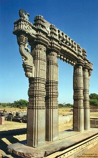 Kakatiya Kala Thoranam (Warangal Gate) built by the Kakatiya dynasty in ruins; one of the many temple complexes destroyed by the Delhi Sultanate.[36]