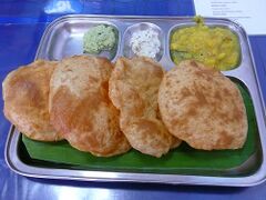 Indian poori with accompaniments