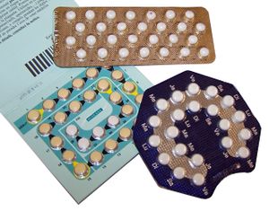 Several packages of birth control pills.