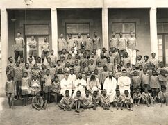 Teachers and students of the "School of Arts and Trades".