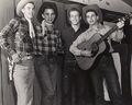 Texan folk costume comprising cowboy hats, jeans and checked western shirts (c.1950).