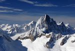 A range of tall, snowy mountains.