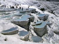 As the limestone sediment reaches a certain level the water accumulates in pools and, as these pools fill up, overflows into smaller pools in the vicinity and from these flows into the small hollows and depressions around