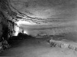 Visitors with a guide inside a cave