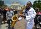 Jarell Harris playing saxophone in Disneyland Hong Kong (40714629233).jpg