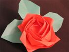 Kawasaki rose using the twist fold devised by Toshikazu Kawasaki. The calyx is made separately.