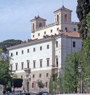 exterior of imposing white building, six storeys high