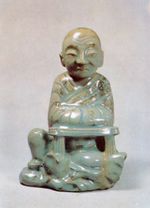 Celadon Seated Arhat with Underglaze White Slip.jpg