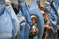 Women and children who were treated at the Egyptian Field Hospital wait in line to exit Bagram Airfield in Bagram, Parwan province, Afghanistan, June 3, 2012 120603-A-ZU930-011.jpg