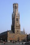 A large tower with a clock near its top.