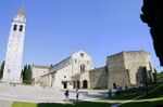 Church in stone and a baptistery