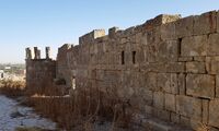 Mosque at Qasr al-Qastal, side wall and minarett.jpg