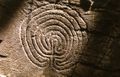 Seven-ring classical labyrinth of unknown age in Rocky Valley near Tintagel, Cornwall, UK.