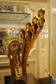 Antique brass instrument on display at the Musical Instrument Museum.jpg