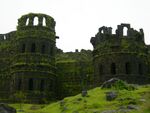 Two fortress towers, partially in ruin