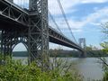 The George Washington Bridge, a double-decked suspension bridge that connects two states, نيويورك and نيوجرزي.