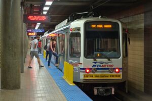 Passengers entering a subway train