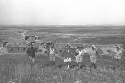 SETTLERS GOING OUT TO WORK IN THE NEWLY ESTABLISHED MOSHAV HAGOR IN THE SHARON PLAIN. חקלאים עובדים בשדות במושב חגור בשרון.D27-077.jpg